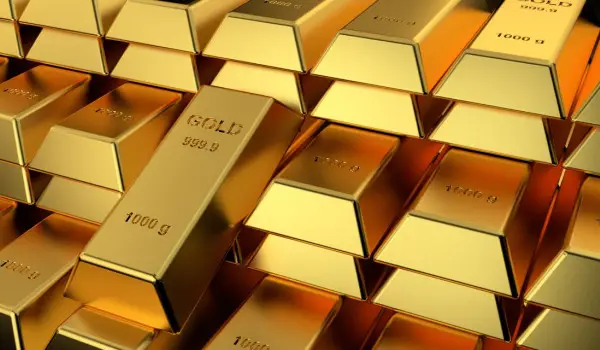 Gold prices hit 2 week high as weak PMIs dent dollar